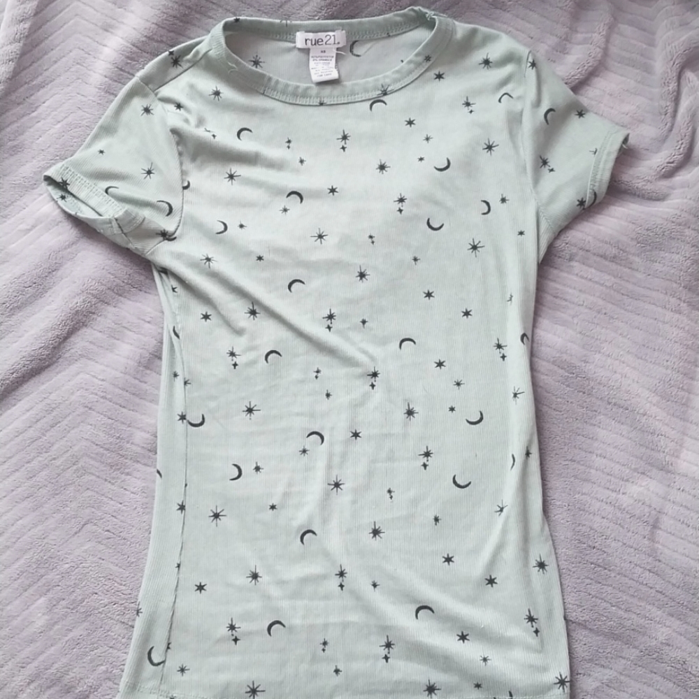 Green tee shirt with stars and moons